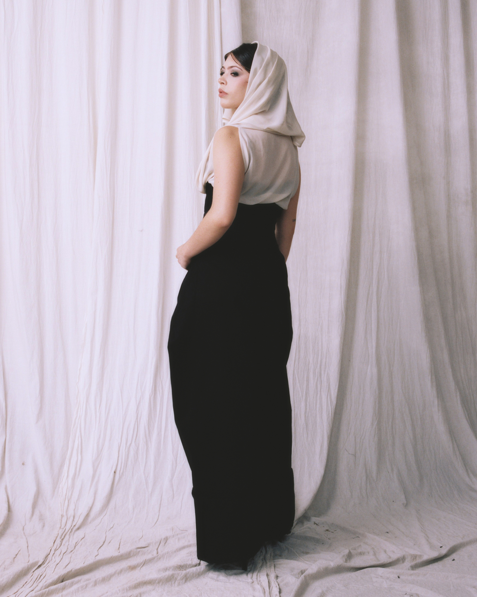 Monáe Simpson — Insurgent Veiled back view