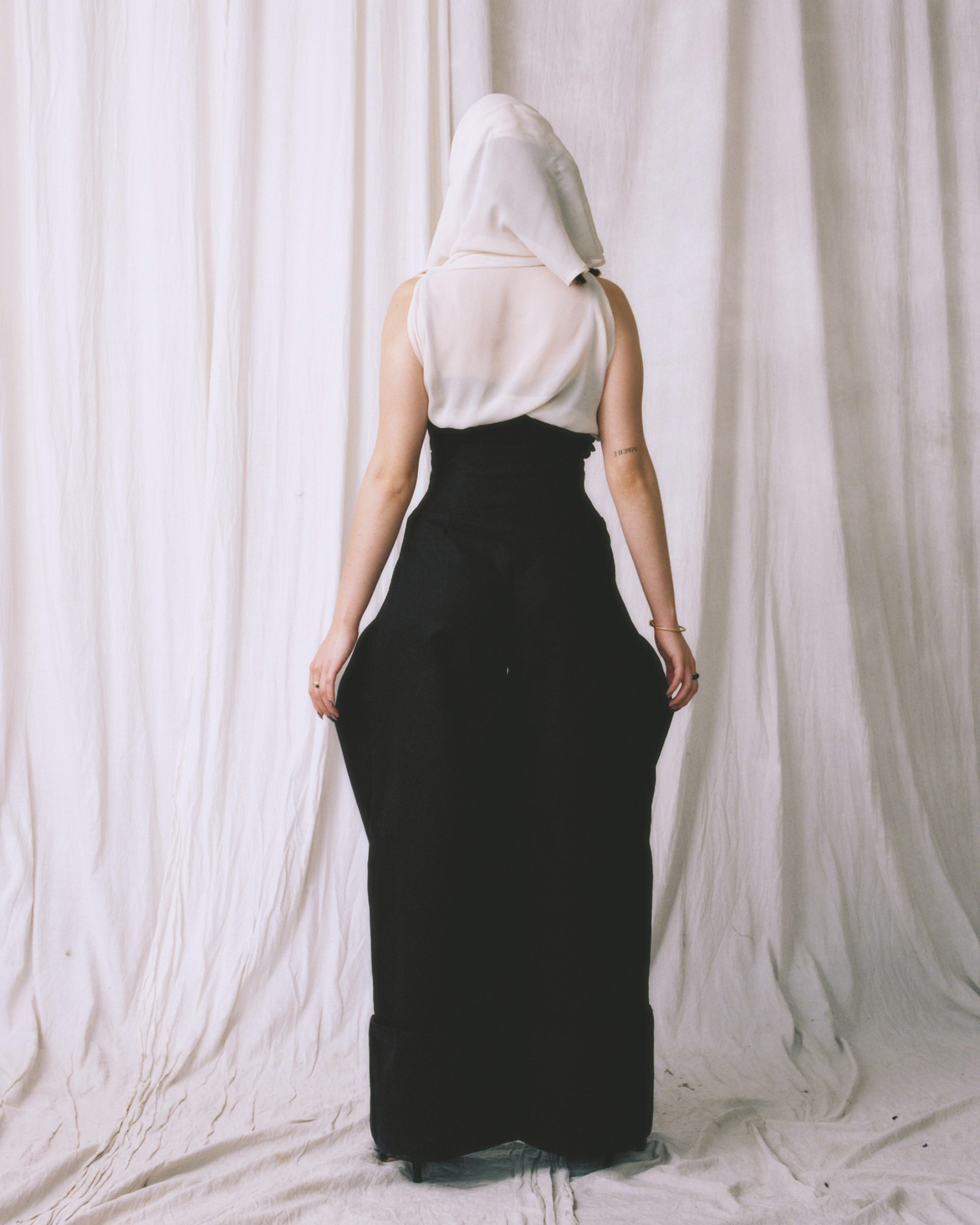 Monáe Simpson — Insurgent Veiled rear hood detail